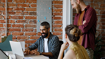 people-work-together-on-laptop